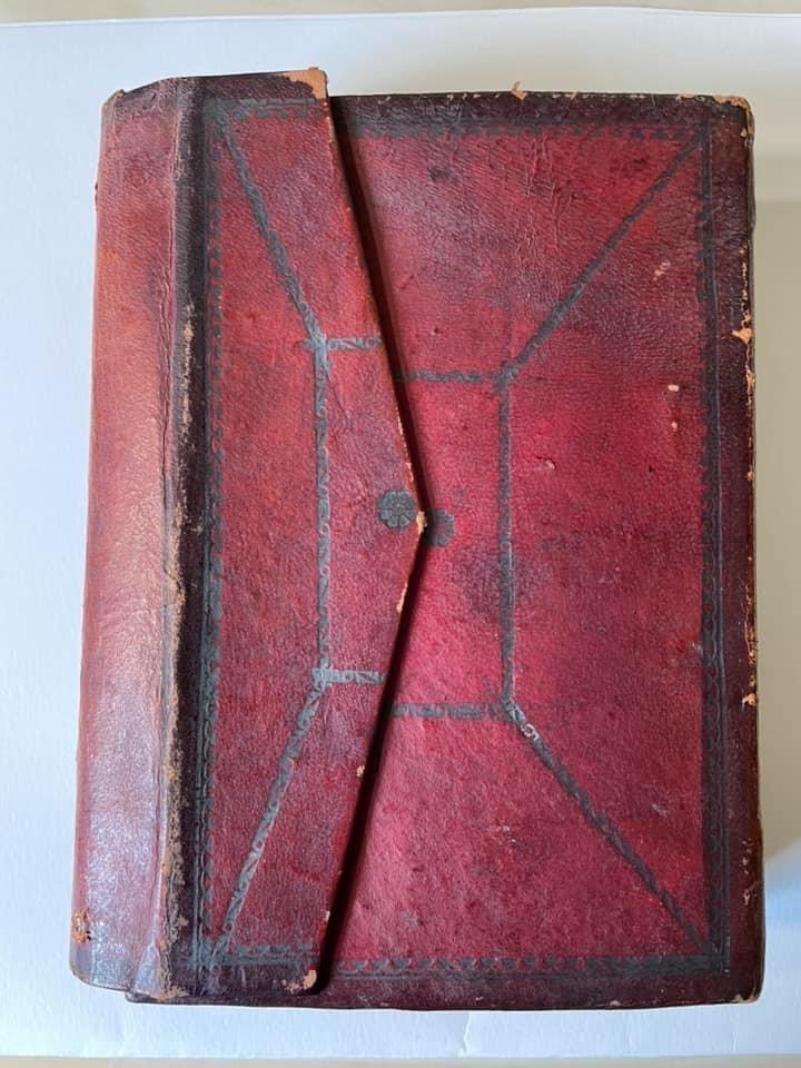 A covered copy of Nazir Ahmad's Qur'an